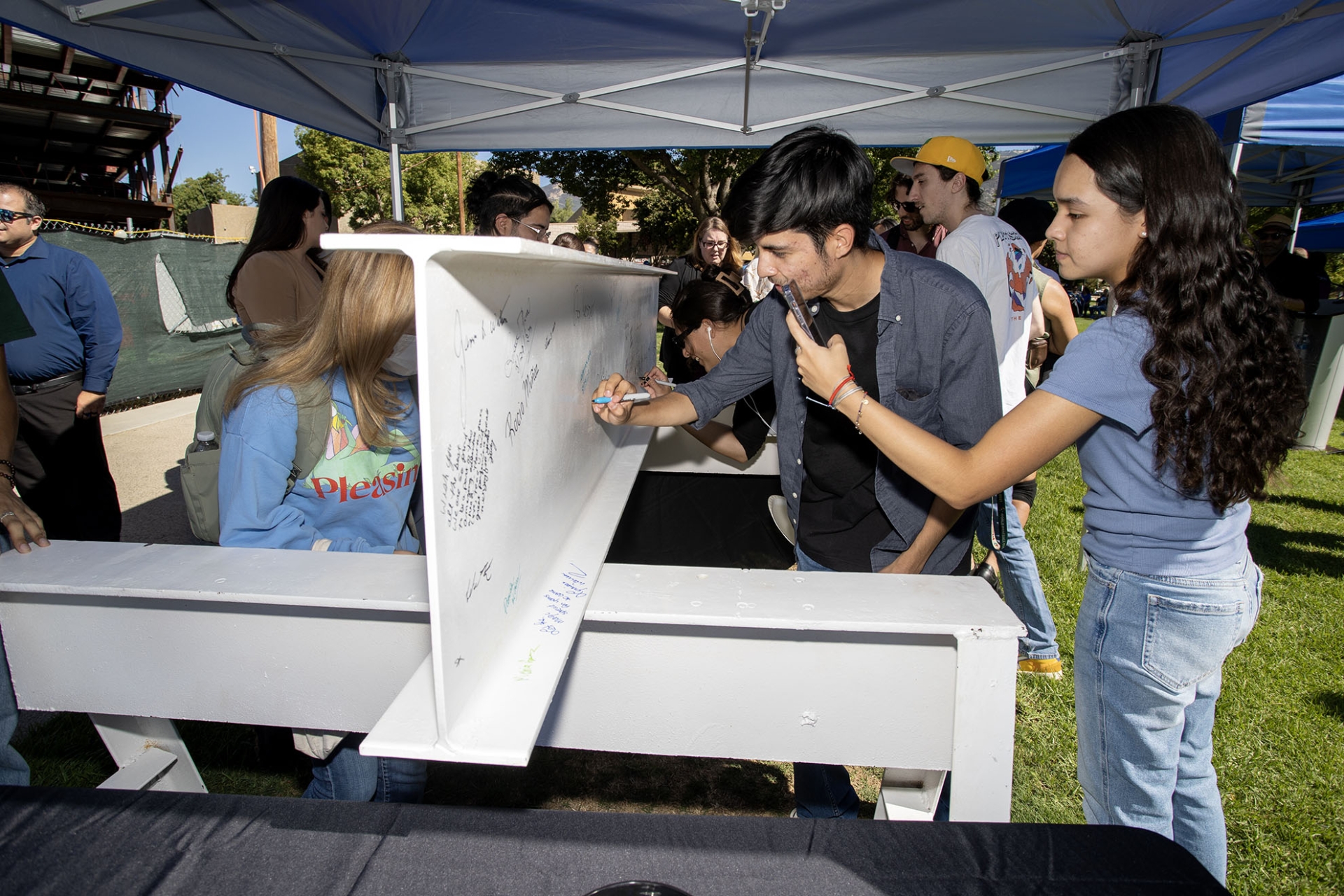The campus community was invited to sign the beam.