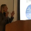 Lecturer pointing at projection