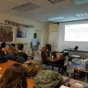 Full Classroom taking notes from projector