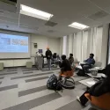 G giving a presentation on Murals