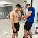 Dillon putting knowledge to practice in the kinesology lab