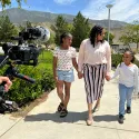 Tierra displaying her family as she is not a traditional student