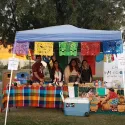 Students at club table for market night