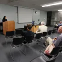 People listening to lecture