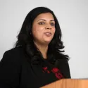 Lady giving speech at lectern