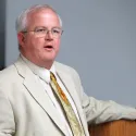 Guy speaking while sitting down