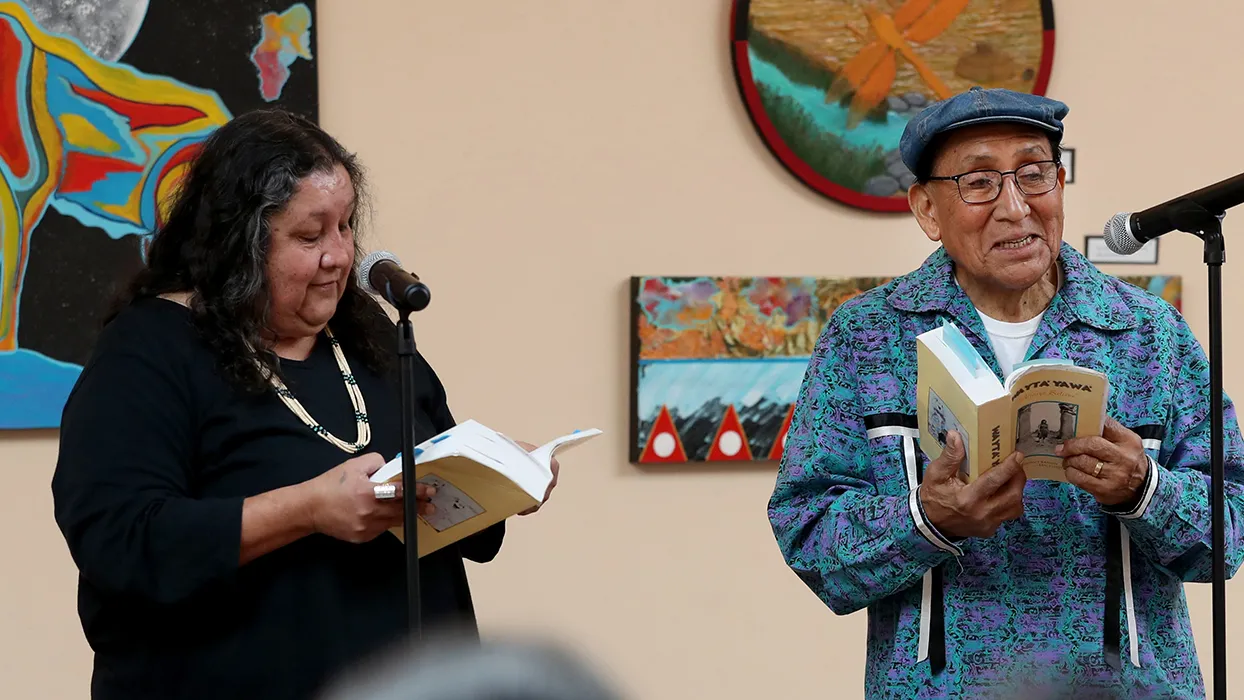 Carolyn Horsman (left) and Ernest Siva, elder of Morongo Band of Mission Indians, at the annual Native Voices Poetry Festival