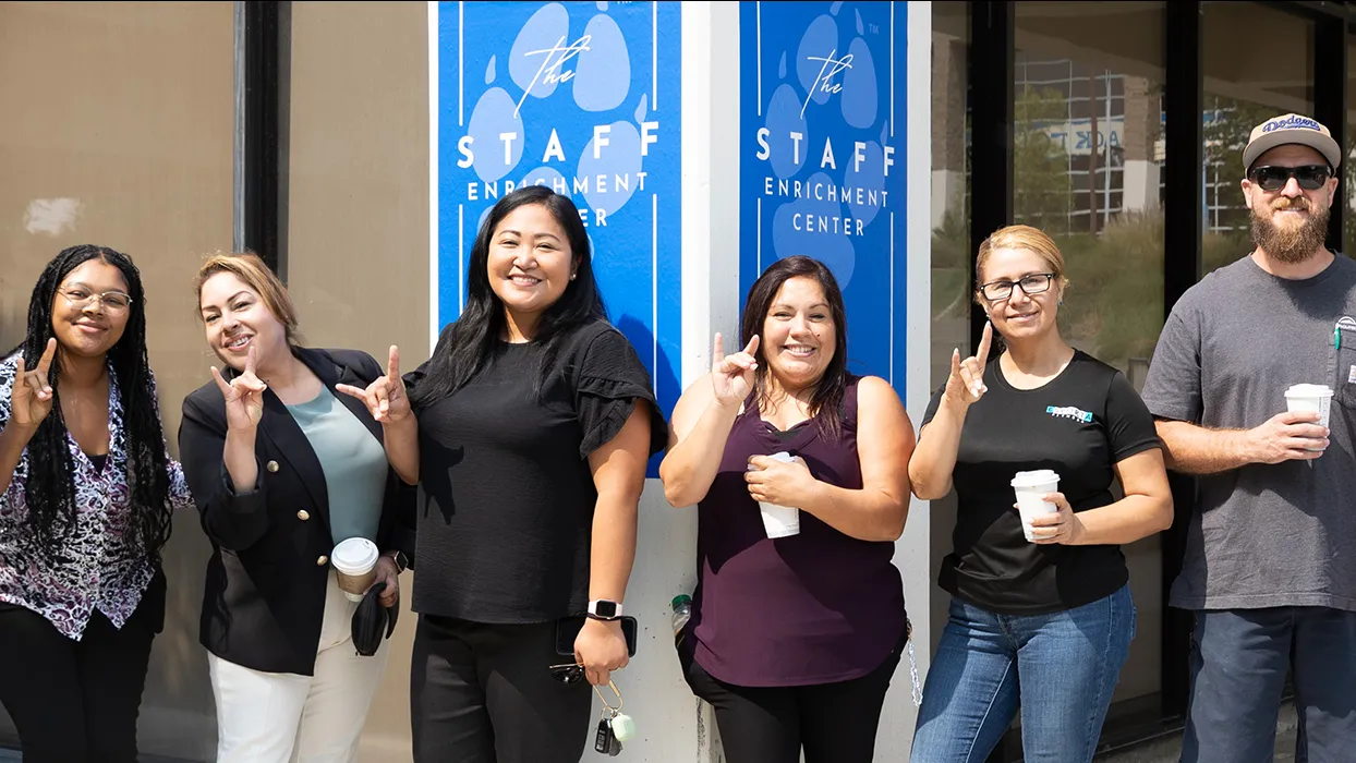 CSUSB staff display Coyote spirit at the grand opening of the Staff Enrichment Center on Sept. 12.