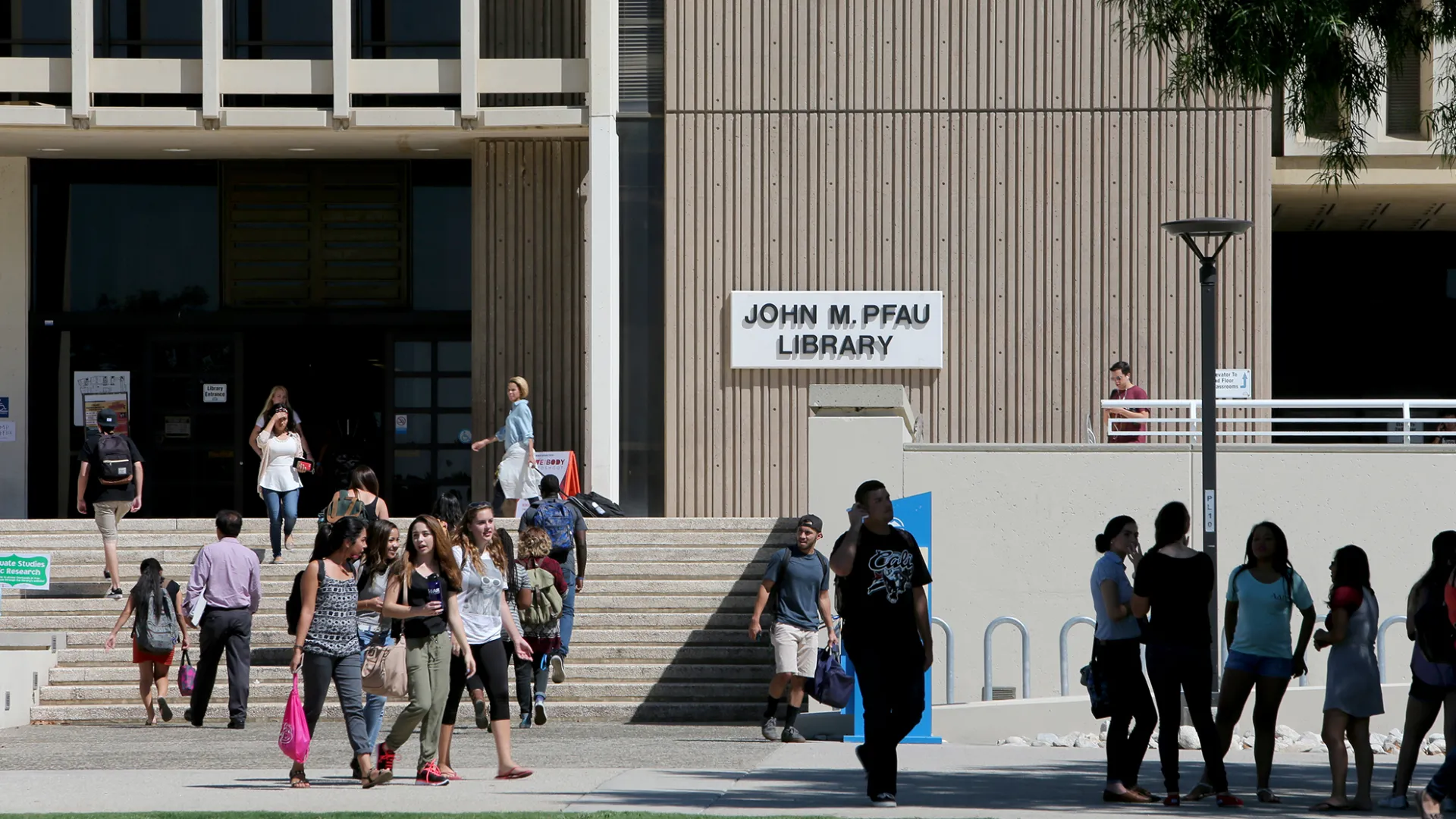 Students outside the John M. Pfau Library