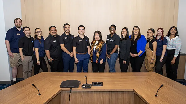 CSU trustees Darlene Yee-Melichar (center),  Leslie Gilbert-Lurie (fifth from right) and Yammilette Rodriguez (fourth from right) meet with CSUSB Associated Students Inc. officers.