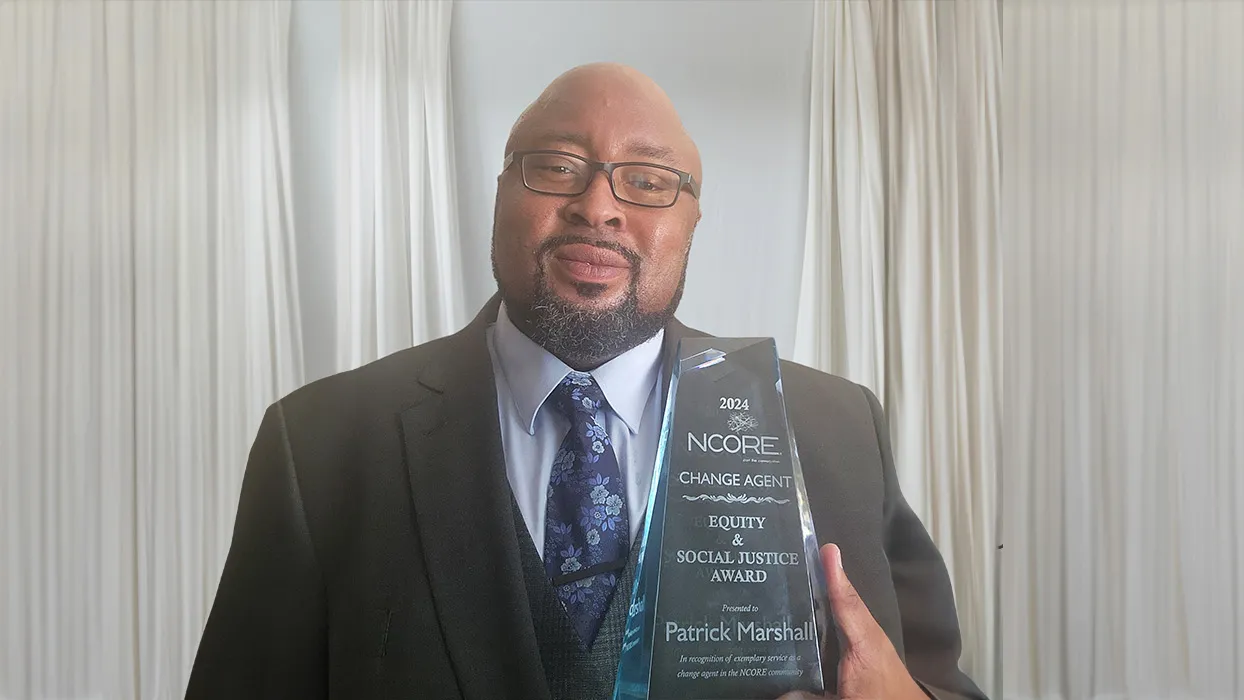 Patrick Marshall, CSUSB alumnus and inmate rehabilitation manager for Santa Clara County Sheriff's Office, with the 2024 Equity and Social Justice: Change Agent Award.