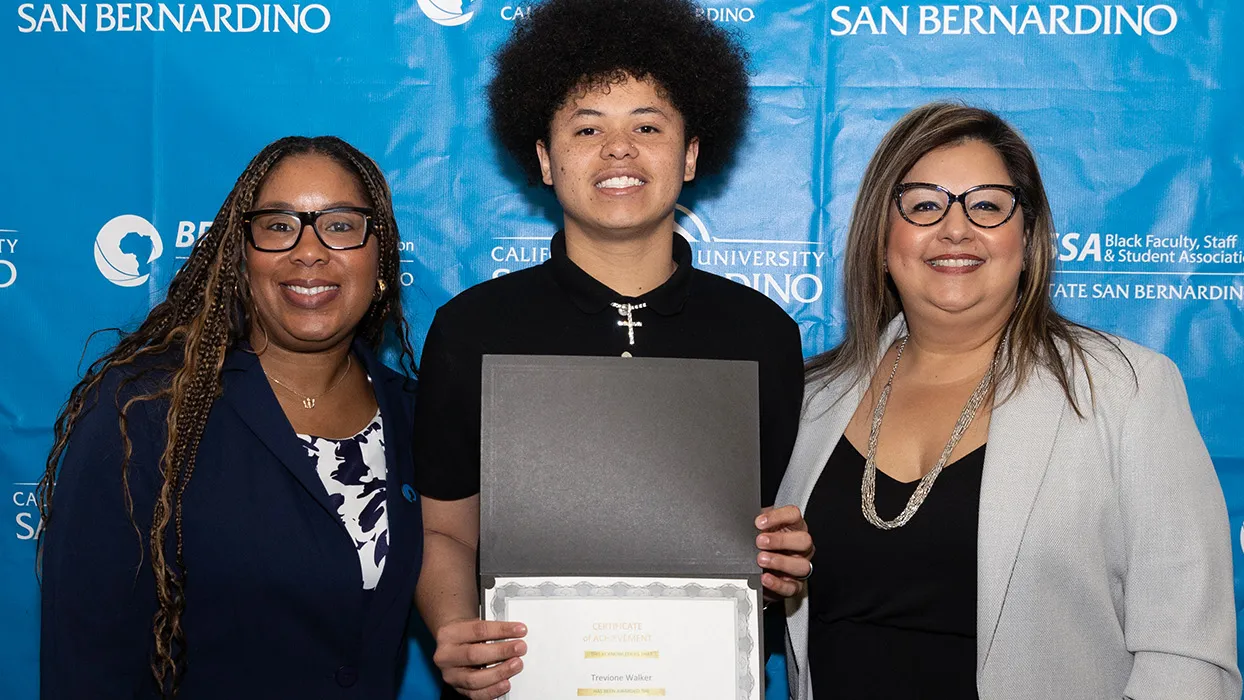Keisha Rivers, left, associate director of Financial Aid and Scholarships, and Veronica Ramirez Amerson, right, director of the Educational Opportunity Program, announced the recipients of the student scholarships at this year’s Pioneer Breakfast.