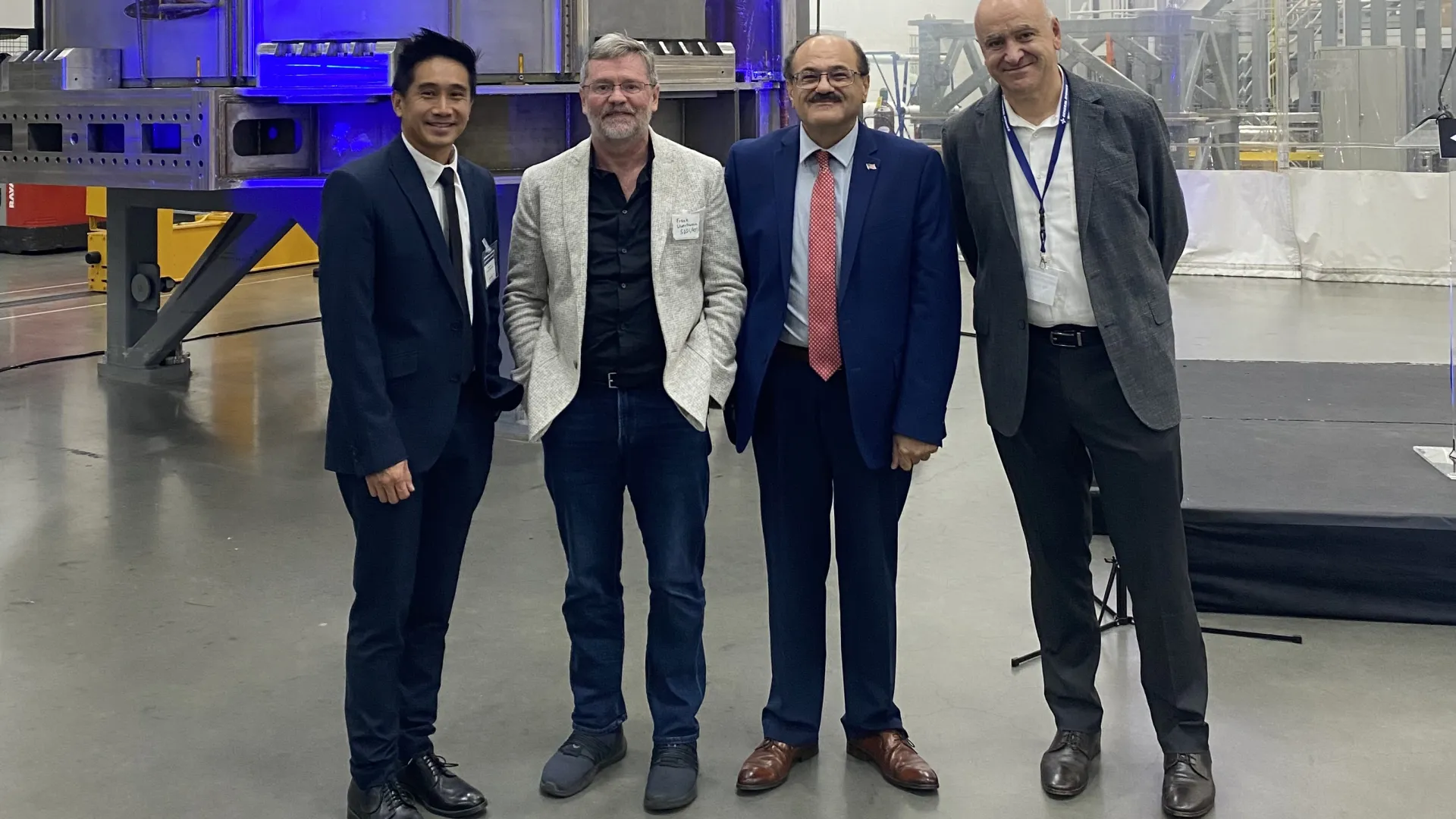 At General Atomics’ Magnet Technologies Center in San Diego on Aug. 28, from left: Gerard Au, CSUSB deputy chief information officer and chief information security officer for Information Technology Services; Frank Wuerthwein, professor, UC San Diego; Khalil Dajani, chair/director, CSUSB School of Computer Science and Engineering; and Raffi Nazikian, senior director, General Atomics, Magnetic Fusion Energy.