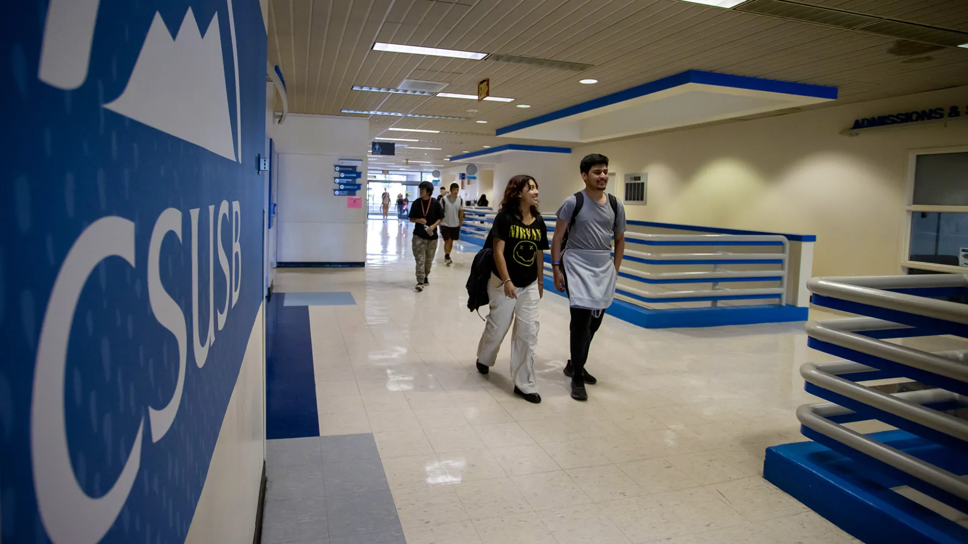 Students walk through University Hall.