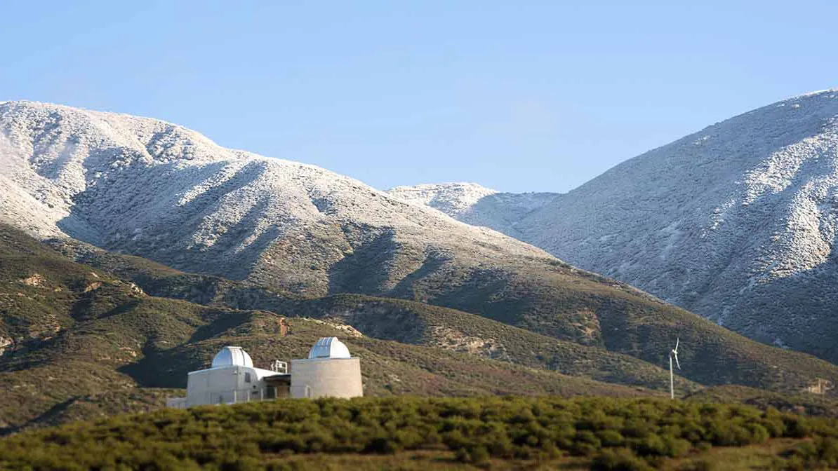 Snow-capped foothills and the Murillo Family Observatory