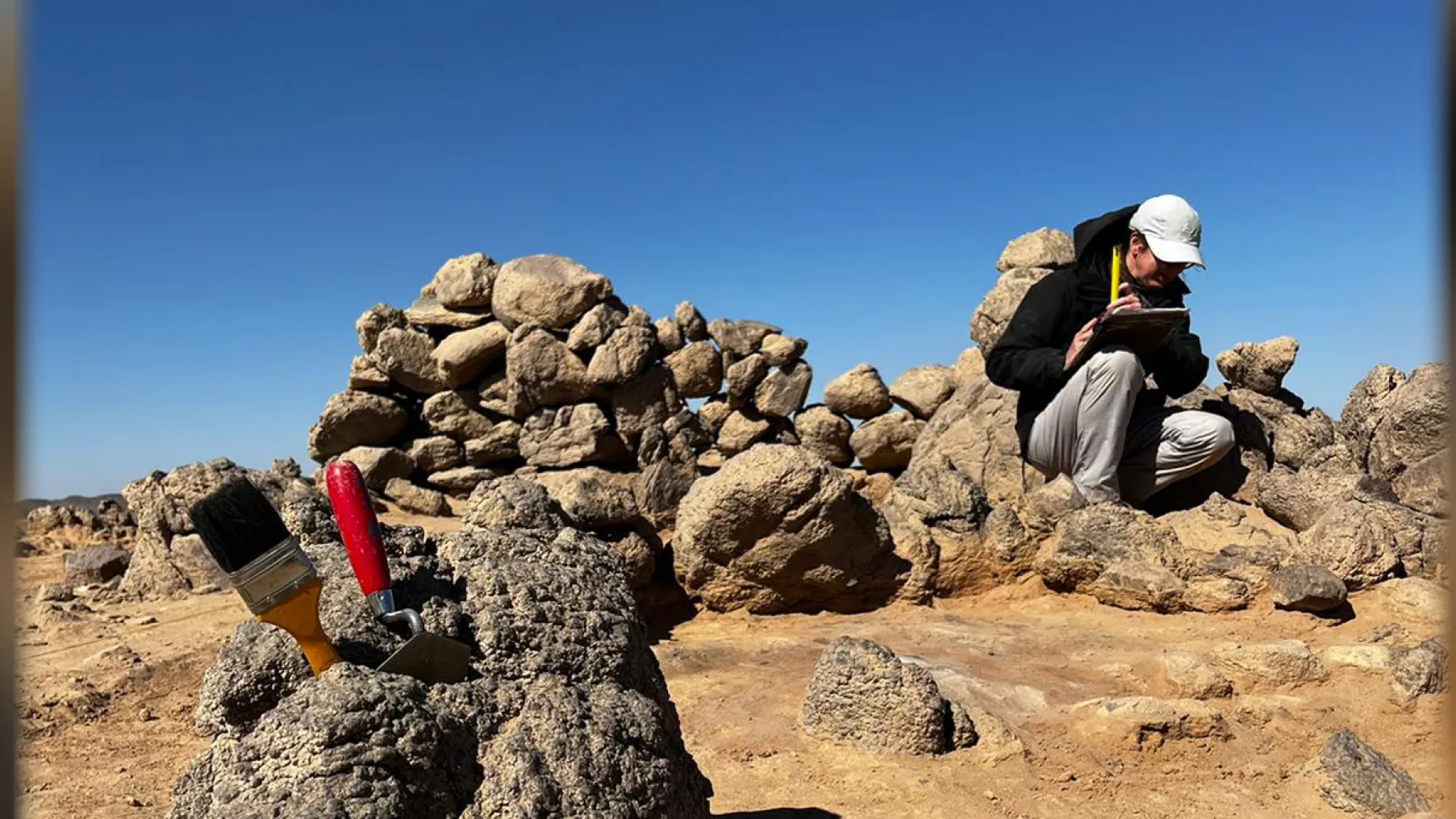 A researcher at Wadi el-Hudi, Egypt, an important but long-overlooked region of county’s Eastern Desert located southeast of Aswan.