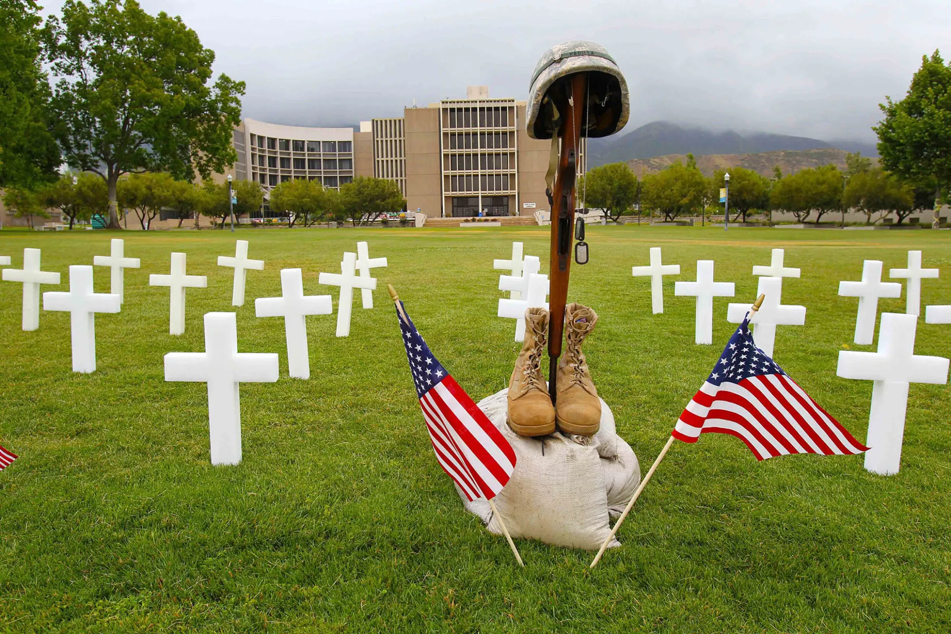 A Memorial Day display in front of the John M. Pfau Library.