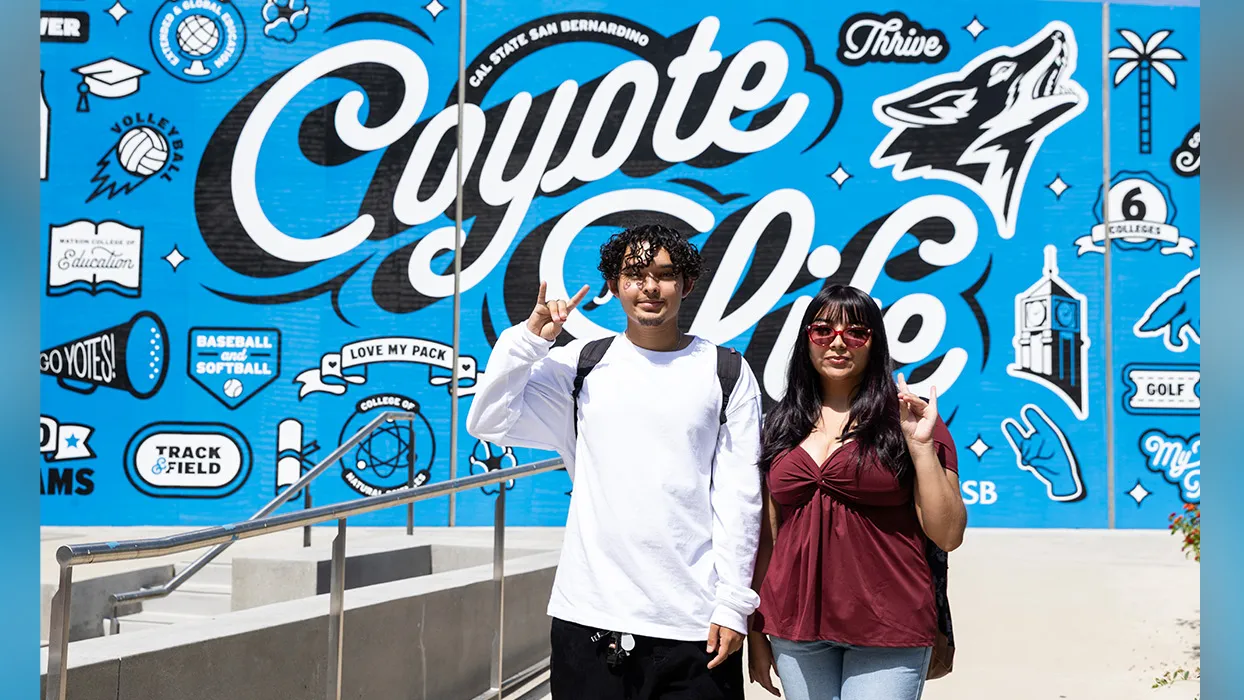 Two students were all smiles in front of the Santos Manuel Student Union North on the first day of fall classes at CSUSB. 
