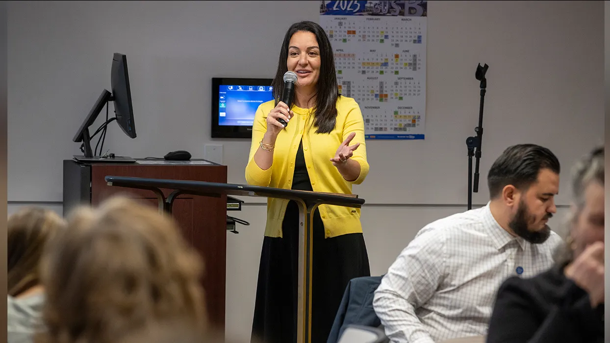 Kelly Campbell, CSUSB vice provost, accreditation liaison officer and a senior diversity officer, speaking during a Growing Leadership Opportunities for Women (GLOW) event in 2025.