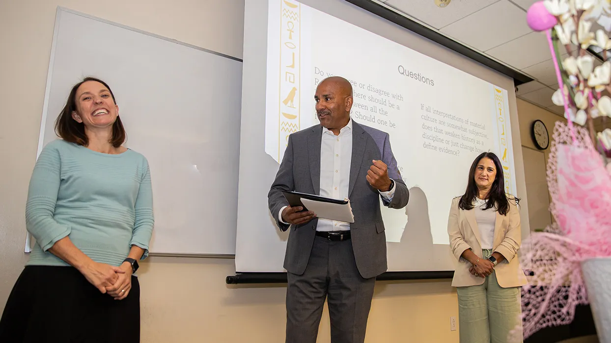 In a surprise announcement, Kate Liszka, left, professor of history and the Benson and Pamela Harer Fellow in Egyptology at CSUSB, was named the winner of Cal State San Bernardino’s 2025-26 Outstanding Scholarship, Research and Creative Activities Award on April 24. 