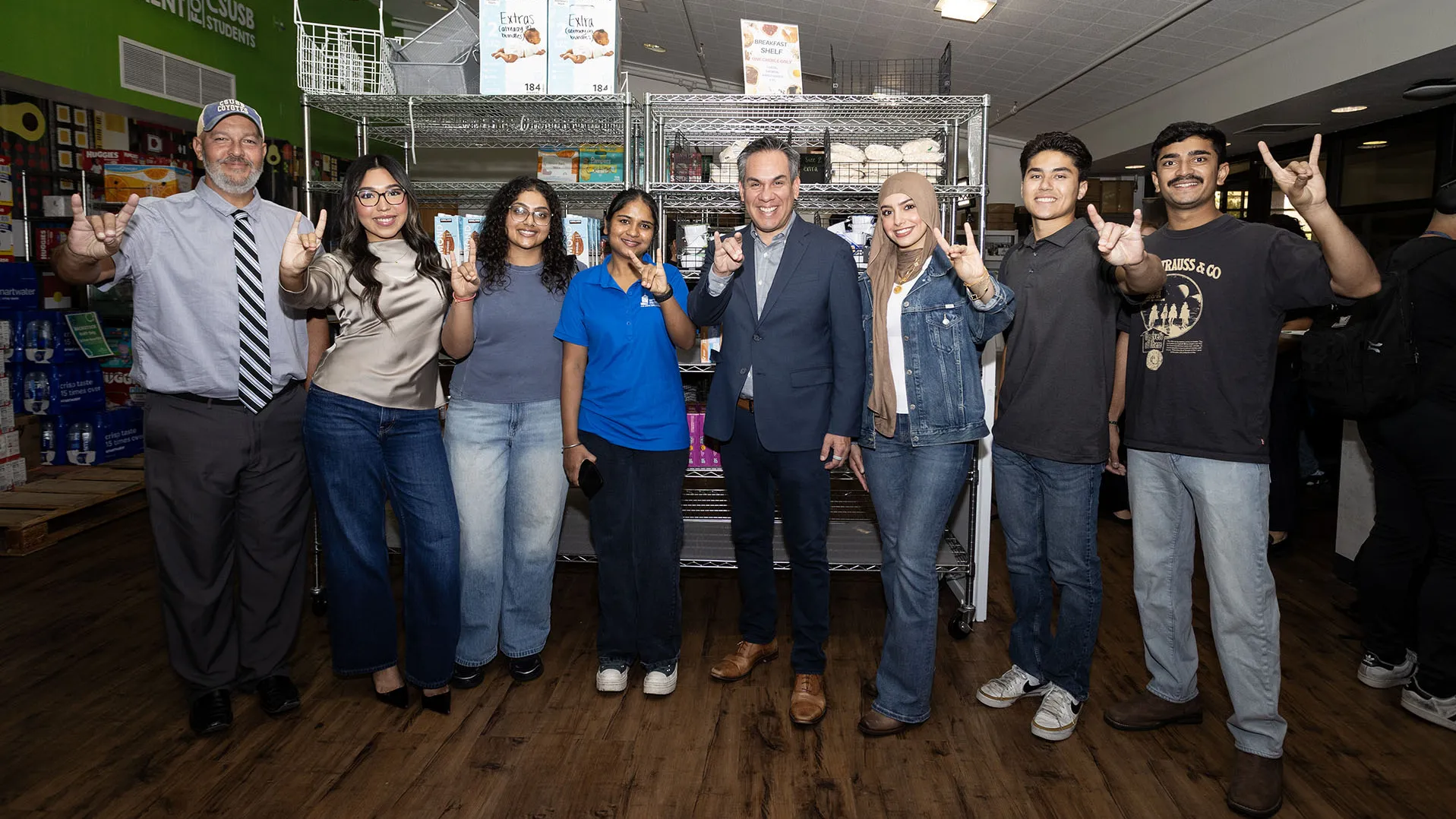 CSUSB students and staff joined U.S. Rep. Pete Aguilar (in center) during his visit to the Obershaw DEN on Oct. 7