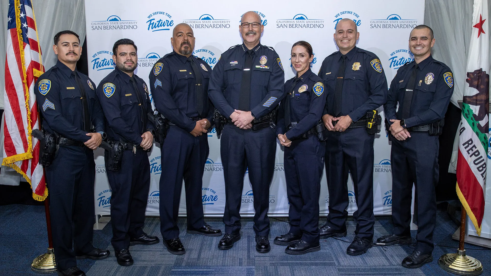 Chief Steven Griffin (center) and members of the CSUSB University Police Department.
