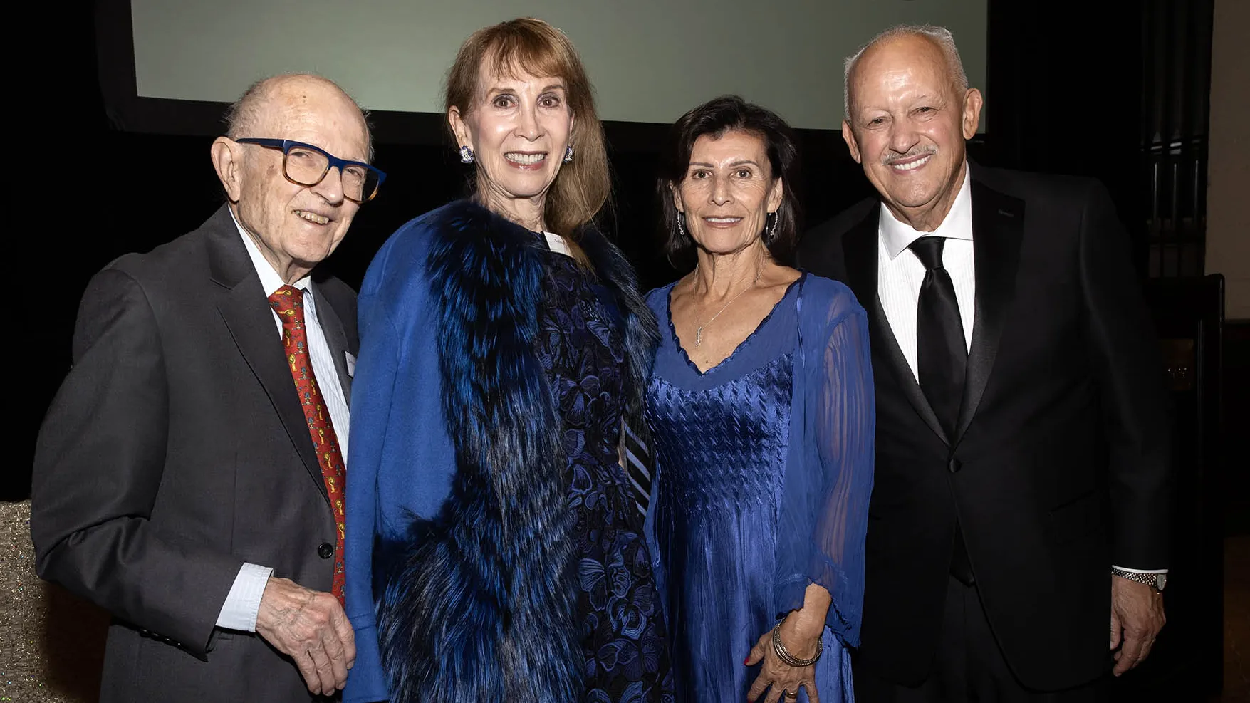 From left, W. Benson Harer, Adina Lee Savin, Evie Morales and President Tomás D. Morales.
