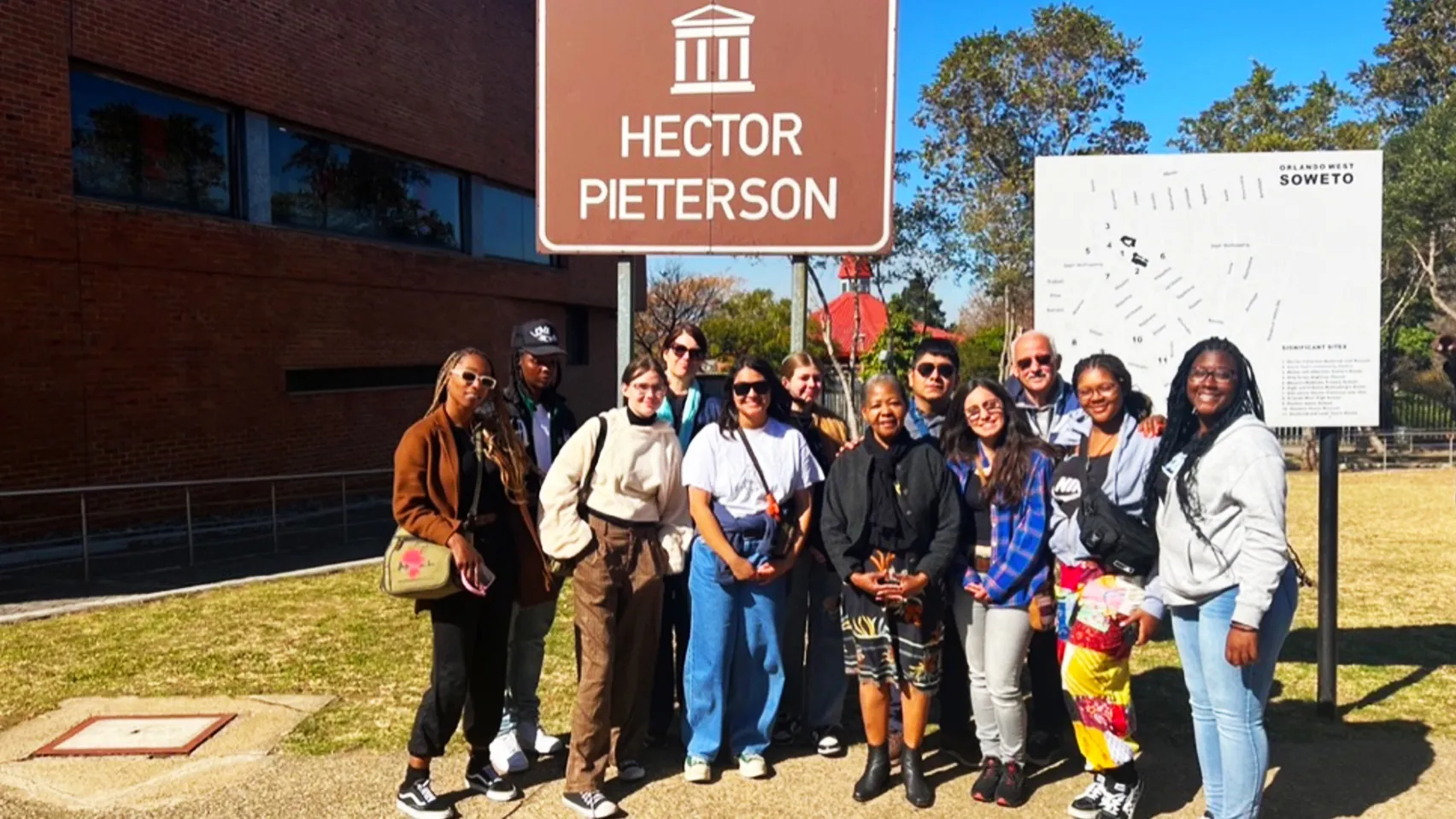 During their study abroad trip to South Africa this summer, CSUSB students and university President Tomás D. Morales met Antoinette Sithole (standing front, center), whose brother, Hector Pieterson, was killed during the 1976 Soweto Uprising.