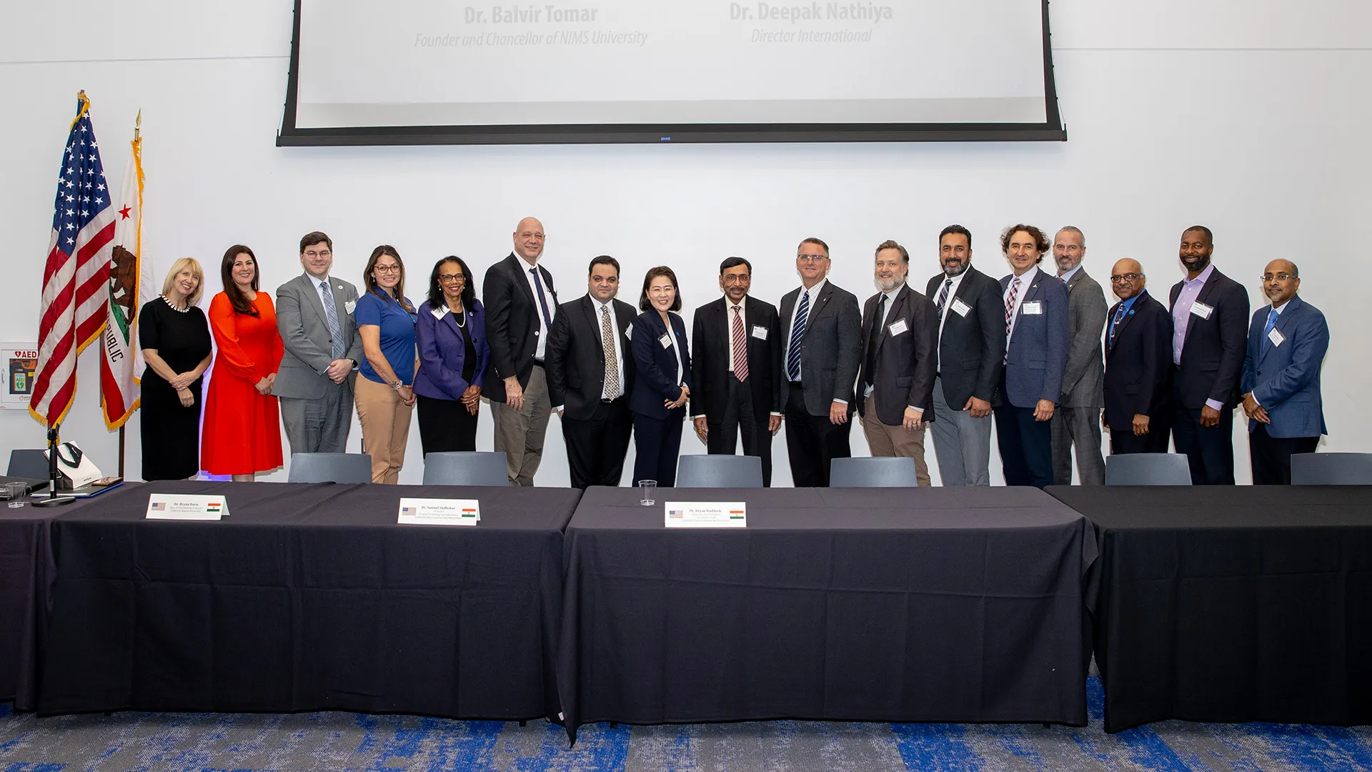 Representatives of CSUSB and NIMS University at the Dec. 6 signing of the memorandum of understanding.