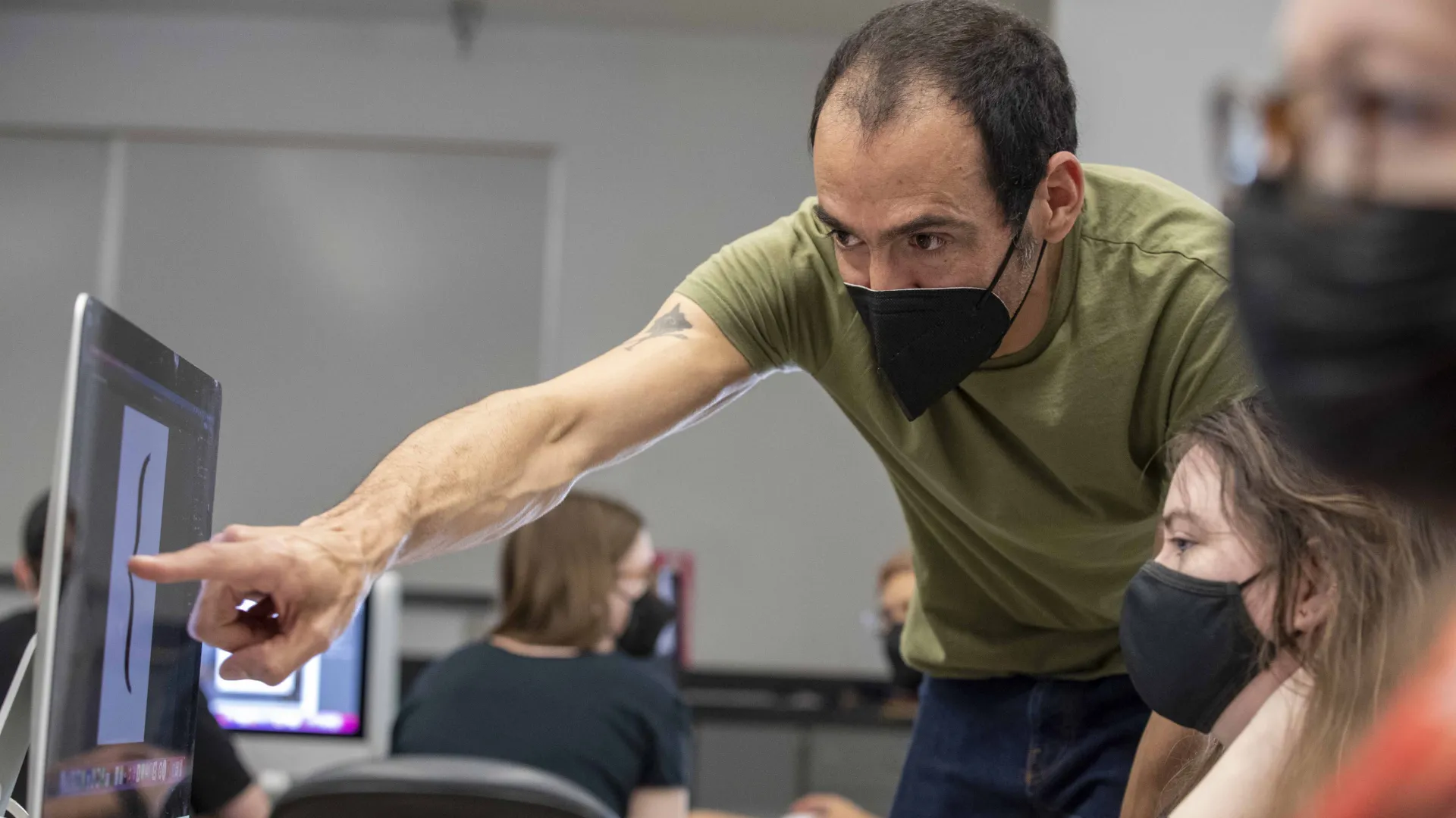 CSUSB students working with an international artist 