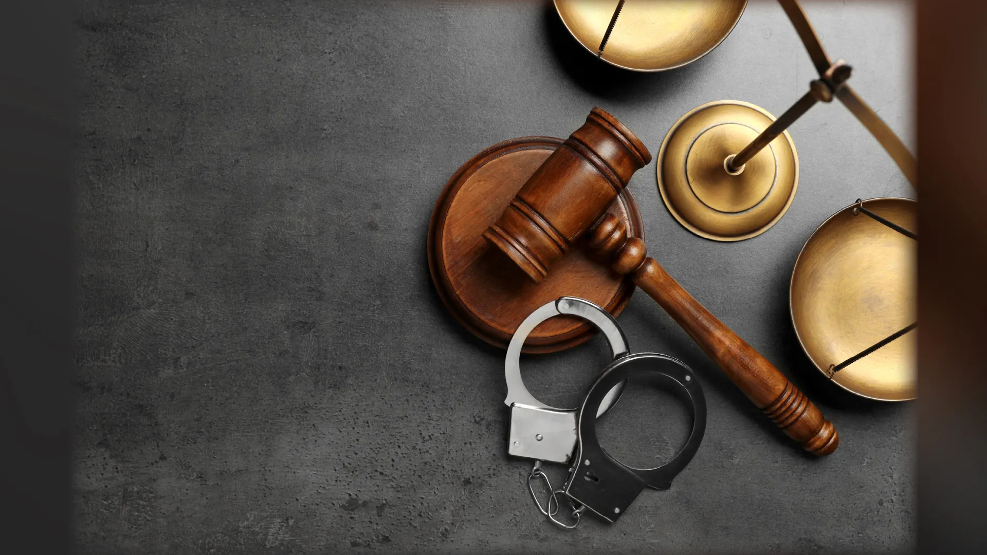 Illustration of criminal justice: gavel, handcuffs, scale