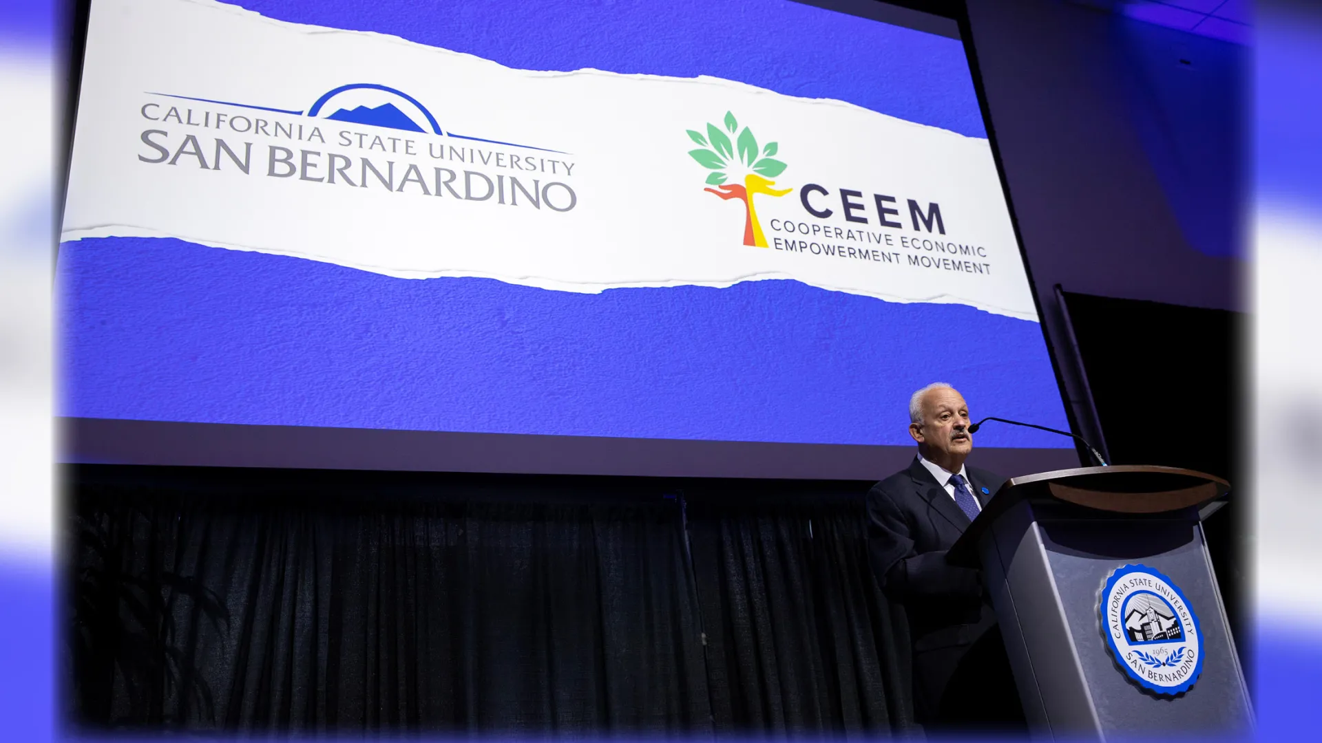 CSUSB President Tomás D. Morales speaking at the podium