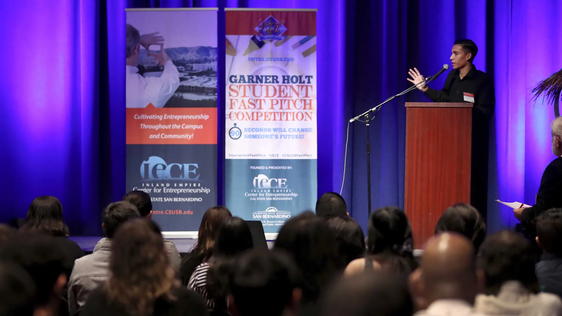 A student makes a presentation at the 2019 Garner Holt Student Fast Pitch Competition. 