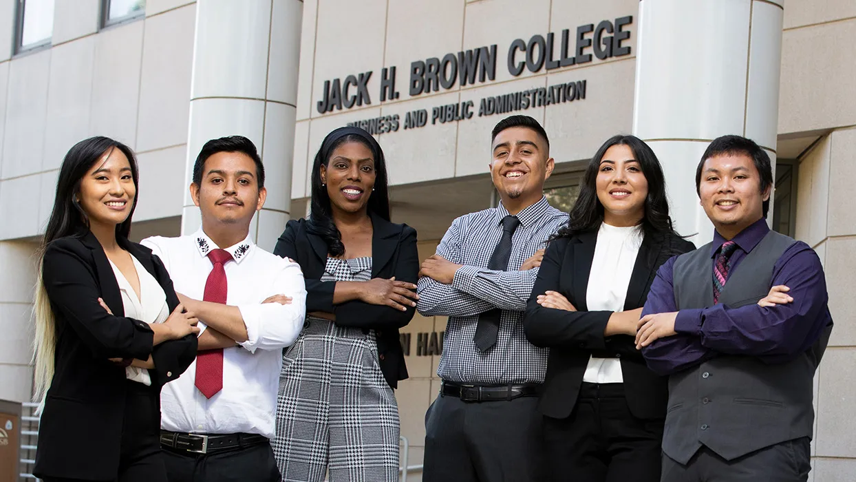 Students in front of Jack Brown Hall.