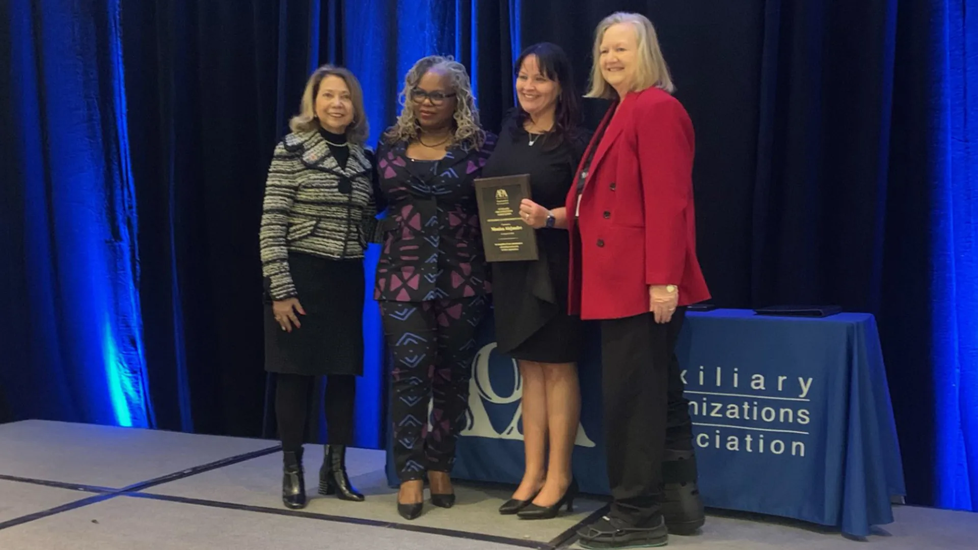 Monica Alejandre, second from right, was awarded receiving the Auxiliary Organizations Association Outstanding Accomplishment Award.