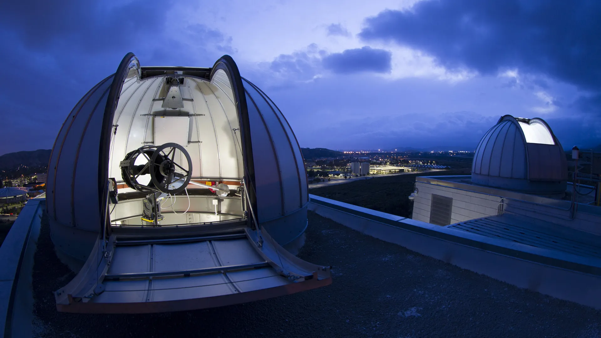 An open telescope dome at the Murillo Family Observatory at CSUSB.