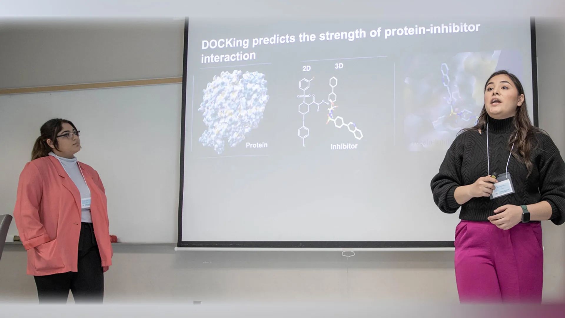 Two students present at the 2023 CSUSB Student Research Competition.