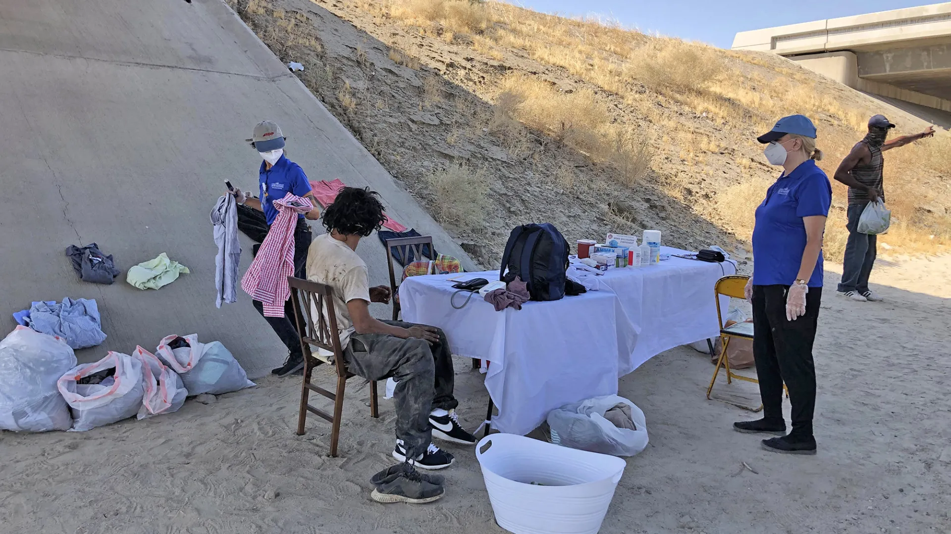 The CSUSB Nursing Street Medicine team assisting community members in the Coachella Valley.