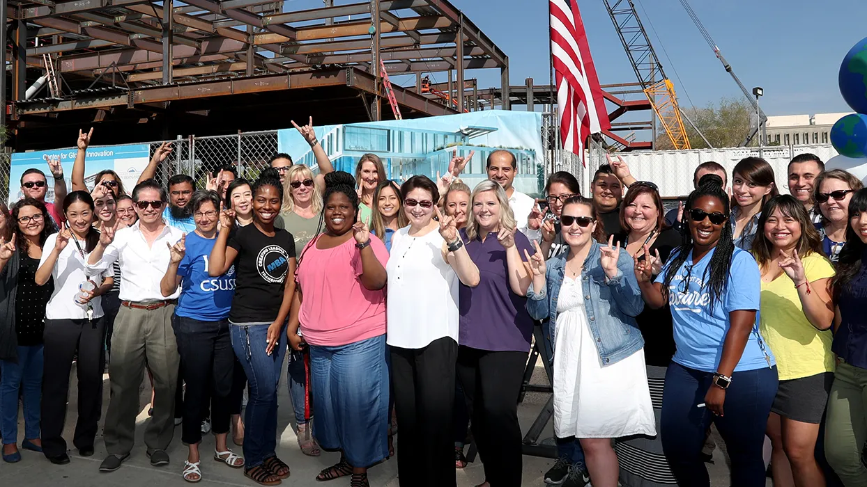 Cal State San Bernardino held a “topping out” ceremony on Aug. 2, to celebrate the installation of the last beam on the new three-story Center for Global Innovation (CGI) building