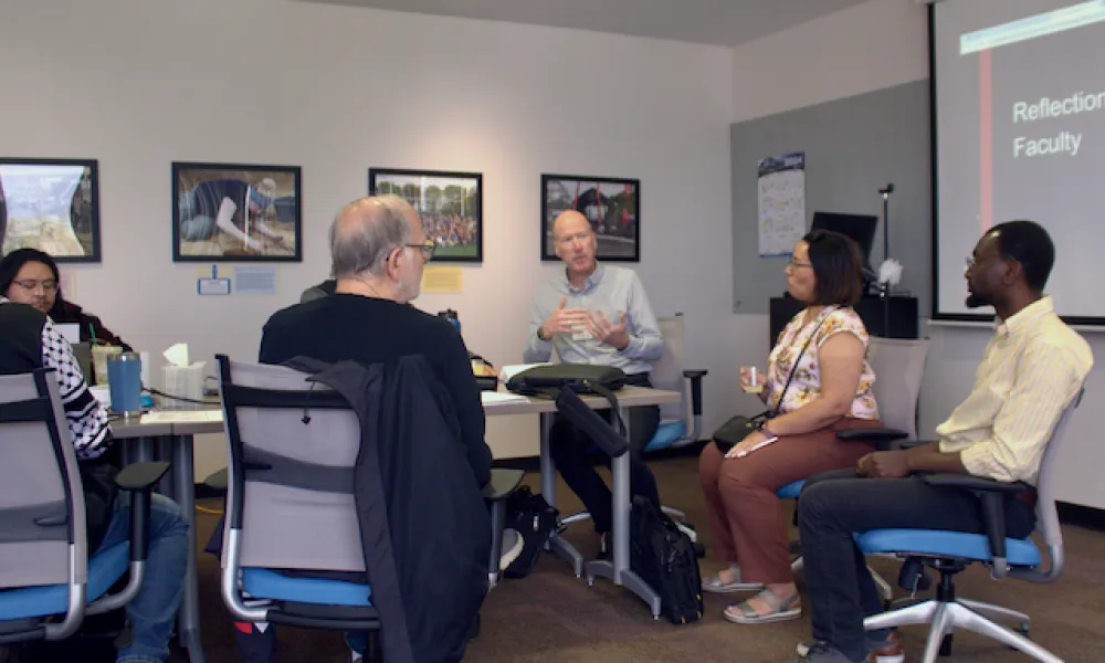 Faculty attending the Asset Based Teaching workshop led by Brian Heisterkamp