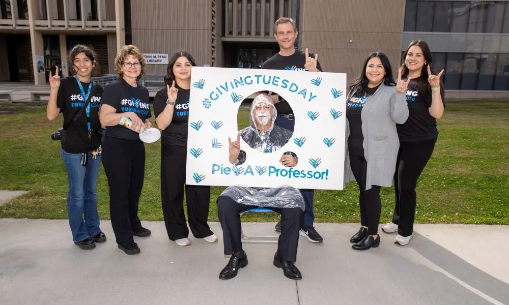 CSUSB’s Giving Tuesday on Coyote Walk at California State University, San Bernardino on Tuesday, Nov. 28, 2023   Jessica Marin, Donor Relations Coordinator, Michelle Skiljan, Senior Director of Philanthropy, Foundation and Corporate Relations, Susana Barbosa, Director of Annual Giving, Office of Philanthropic Giving, California State University, San Bernardino, (seated) J. Tomás Gómez-Arias, Dean, Jack H. Brown College of Business & Public Administration, California State University, San Bernardino, Ray Wat