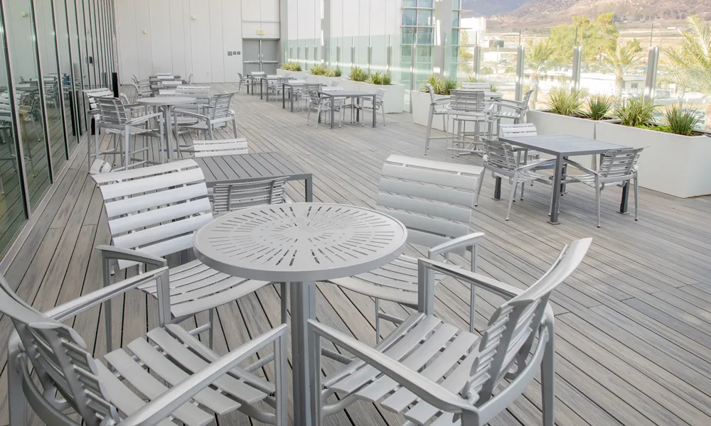 A close-up shot of a modern outdoor setting with a view of the San Bernardino Mountains.