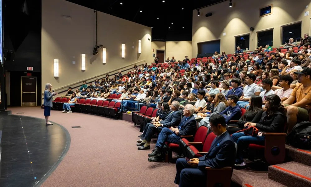 Dr. Michelle Russen presenting to high school students at Open House.