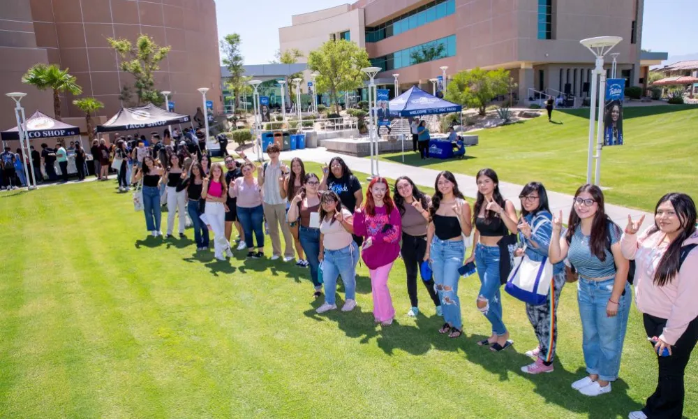 Students standing on the lawn at CSUSB Palm Desert Campus