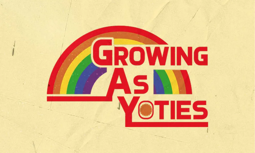 Logo with “Growing As Yoties” in bold red retro capital letters, stacked on three lines, in front of a rainbow arch. The rainbow has red, orange, yellow, green, blue, and purple bands. The background is pale yellow with a worn paper texture.