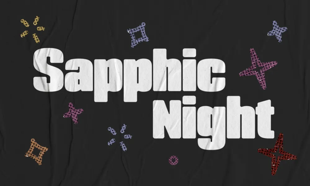 Poster with the words “Sapphic Night” in large, bold white letters on a dark charcoal background. Small four-pointed sparkle shapes in gold, blue, pink, orange, and red are scattered around the text.