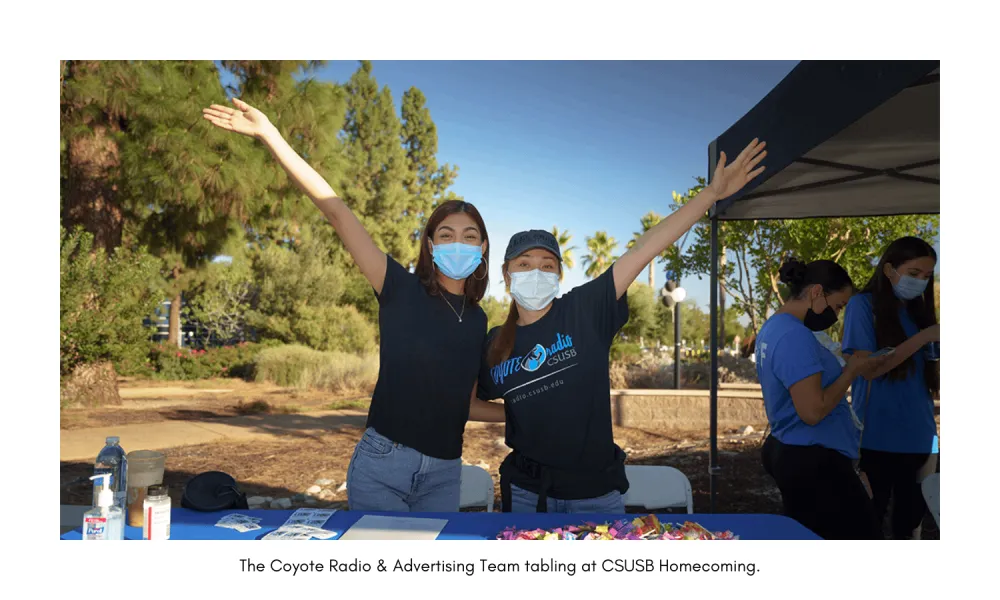Coyote Radio & Advertising Team tabling at CSUSB Homecoming