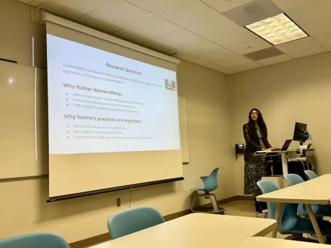 Celeste Martinez presenting with powerpoint screen