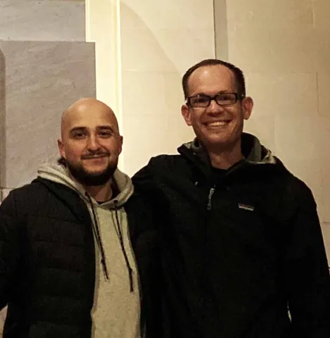 PDC student Armando Bolaños (left) and faculty member Michael Karp (history) visit the Lincoln Memorial in Washington, D.C.