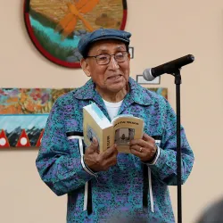 Carolyn Horsman  (left) and Ernest Siva, elder of Morongo Band of Mission Indians, at the annual Native Voices Poetry Festival
